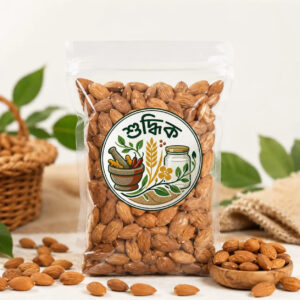 Premium Shudhik Kath Badam (almond) in a clear bowl, showcasing whole, natural nuts with a light brown shell and smooth surface.