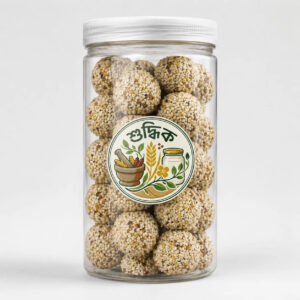 Shudhik Premium Biotin Laddu superfood in jar with sesame and nuts, natural healthy snack with rich ingredients.